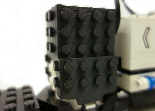 3D printed LEGO compatible monorail motor cover.