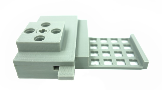 Motor mount brackets for LEGO monorail switches.